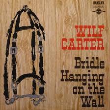 BRIDLE HANGING ON THE WALL - WILE CARTER